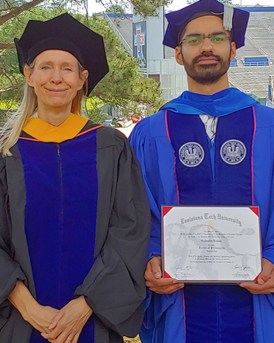 Dr. Lynam with Narendra at graduation
